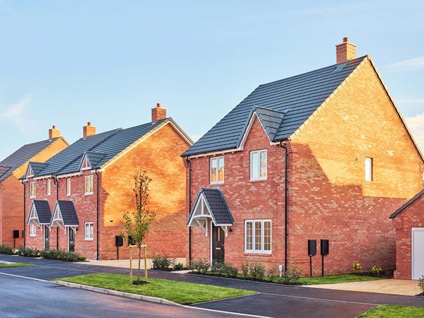 Row of red brick new build houses